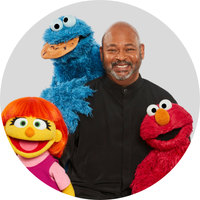 Mitchell with the Sesame Street Characters 